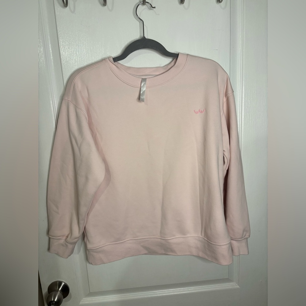 Cute light pink Fabletics pullover with boobie details Breast cancer Awareness